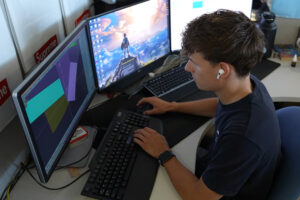 Engineer programing on computers